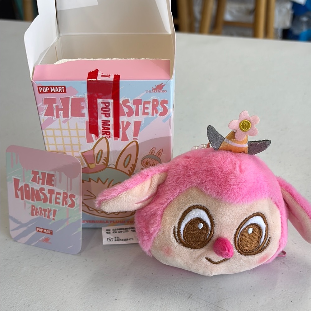 The Monsters party Reversible plush toy open box